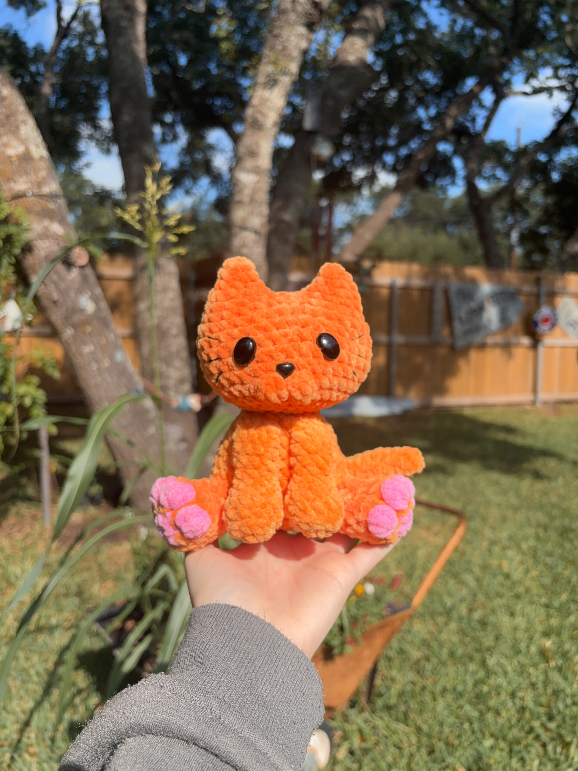 A pink floral glass can cup